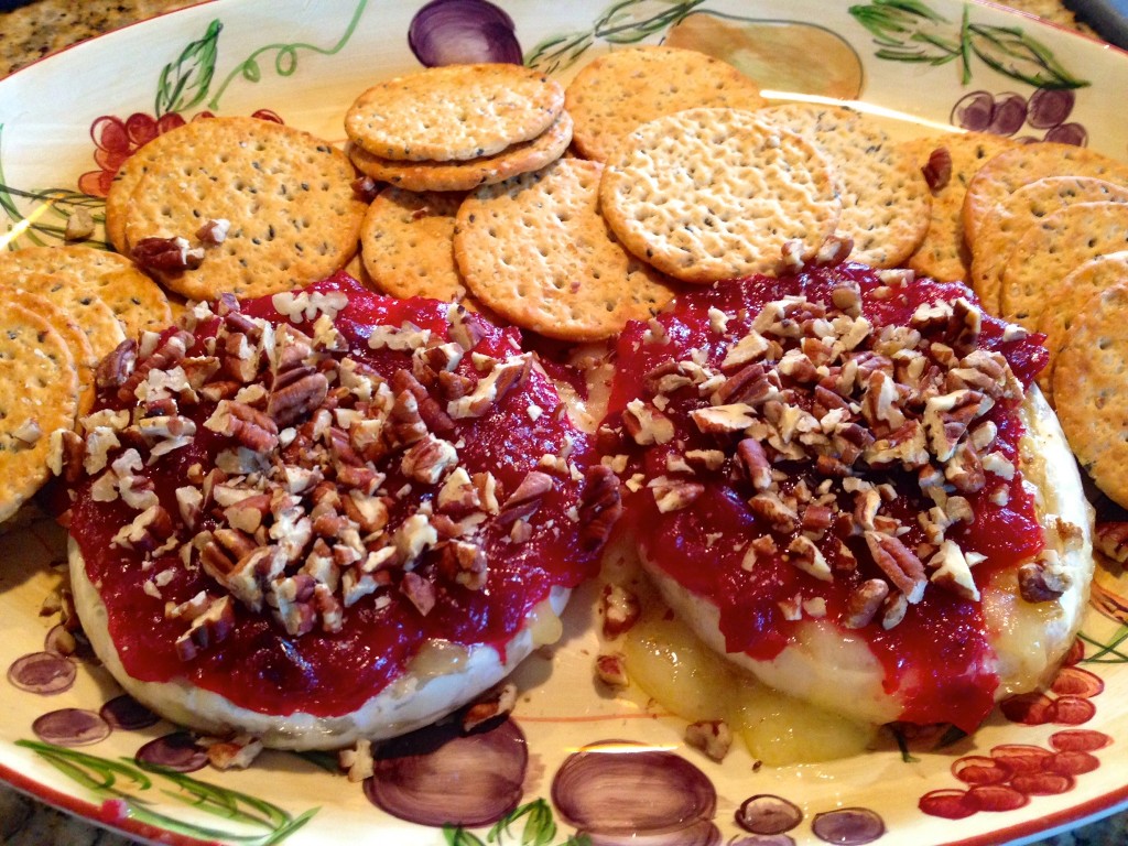 Baked Brie with Cranberry Sauce and Pecans